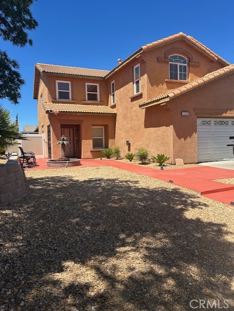 Welcome to this charming two-story home located in a well established Victorville neighborhood, EAGLE RANCH. Step into a bright and open floor plan, featuring three spacious bedrooms and three full bathrooms. Upon entering, you'll be greeted by a bright and airy spacious living room, adjacent the living room, kitchen with upgraded granite countertop, plenty of cabinetry ideal for culinary adventures, family room connected. The generous backyard is an oasis perfect for family entertainment and relaxation, featuring built-in barbecue pit, refrigerator perfect for weekend gatherings, holidays or special celebration cookouts. The two-car garage provides ample storage and convenience, has been converted to a nice space for man/women to enjoy. As you enter the second level you will land onto a loft, which can be used for a game room, office, exercise room allow your imagination flow for this space. The additional bedroom are all on the second floor. Master bedroom is offers a PEACEFUL SANCTUARY with mirrored closet doors. The community offering park for your children and/or grandchildren enjoyment. COME SEE IT! COME LOVE IT! COME LEASE IT!
