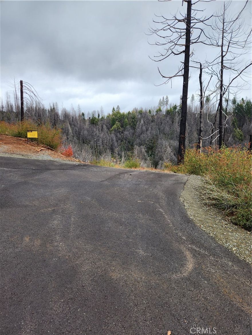 Just over 18 acres of beautiful land right off Oro Quincy Hwy! Cut in roads, Privacy, views, and a nice clearings! Possibilities are endless so don't miss your chance to own this beautiful piece of land today!