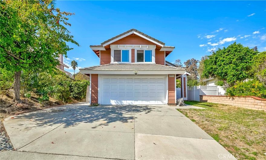 Welcome to this beautifully updated home featuring a remodeled modern kitchen with custom cabinets, quartz countertops, stainless steel appliances, full backsplash, and a single-bowl sink. The open layout connects the kitchen to the family room and breakfast area, where a cozy fireplace overlooks the backyard.   The living room offers cathedral ceilings and flows into the formal dining area, creating a bright and open feel. Additional upgrades include wood-look flooring, dual-pane windows, and fresh interior paint. The fourth bedroom features double doors adjoining the primary suite, offering a flexible space for a nursery, office, or private retreat.   The primary bedroom features an en-suite bathroom with an oversized tub, double sinks, a water closet, and a generous walk-in closet. Located on a private lot with no home behind, the property offers a wide 180-degree mountain view.   Minutes to award-winning Oak Ridge Elementary and nearby parks. A wonderful place to call home.
