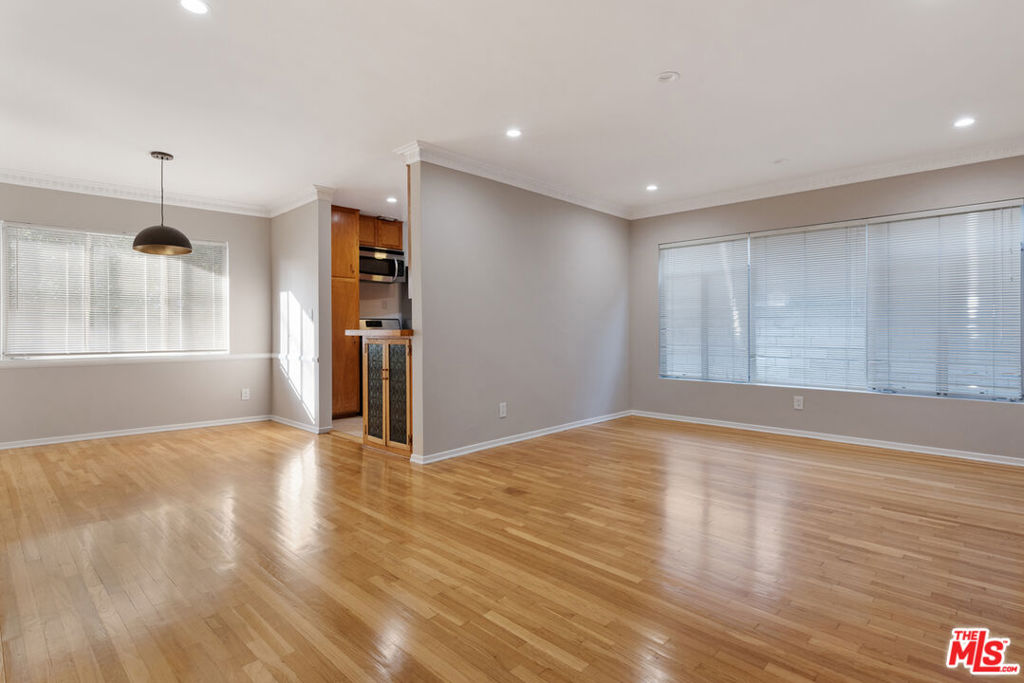 Remodeled 2 bed 2 bath unit w/hardwood floors, recessed lighting, new bathrooms and upgraded kitchen, all appliances including Washer/Dryer in unit. 2 car parking. Will consider pets. Centrally located minutes from Beverly Hills, Century City, Hollywood & The Grove. 25 min from LAX, DTLA & the Beach. Easy to view