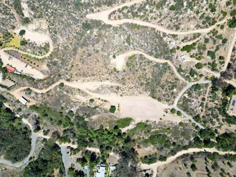 Photo of 5589 Rainbow Creek Road, Fallbrook, CA 92028 (MLS # NDP2606912)