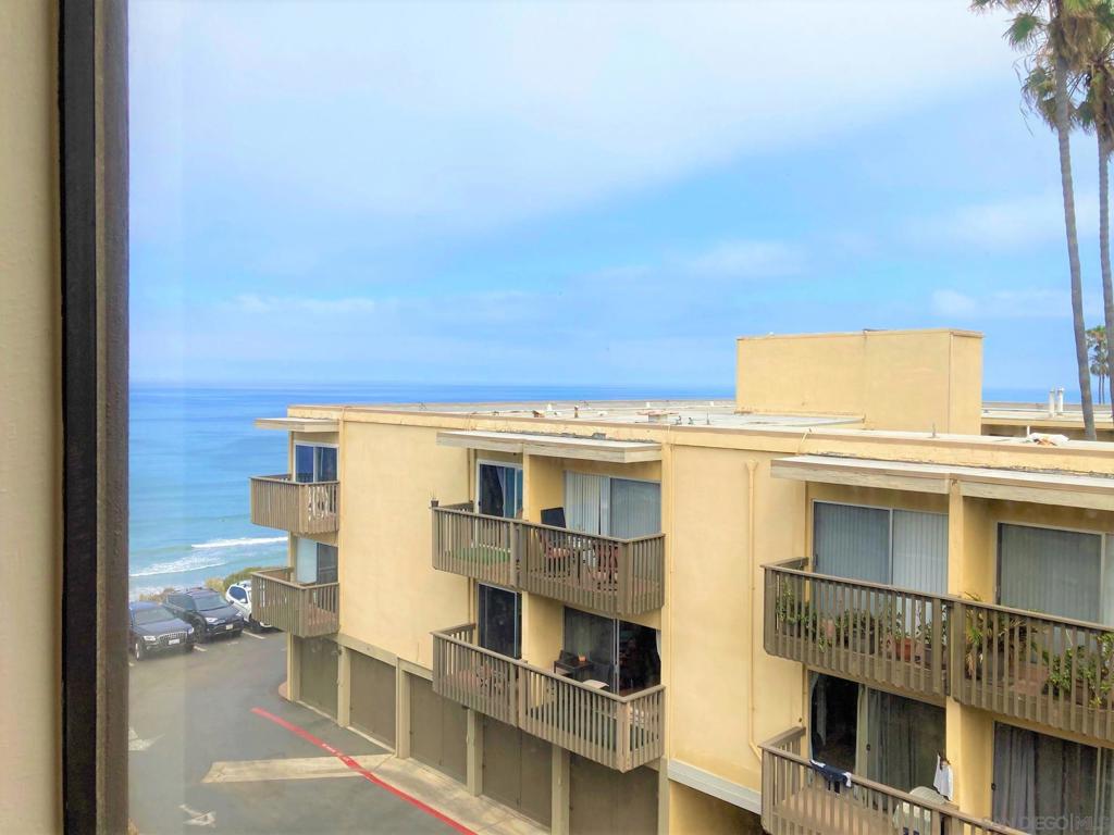 Charming beach complex right on the cliffs in beautiful Del Mar. Relax and enjoy partial sunset and ocean views from the comfort of your living room! This spacious two bedroom, two bath condo features a wide-open living space, quaint kitchen, spacious bedrooms and back balconies with views of the pool and spa. Unit has just been freshened up with new paint throughout, refinished countertops, new faucets and more! Complex features convenient inside elevator, underground parking, storage, laundry room and lush grassy areas overlooking the Pacific Ocean.
