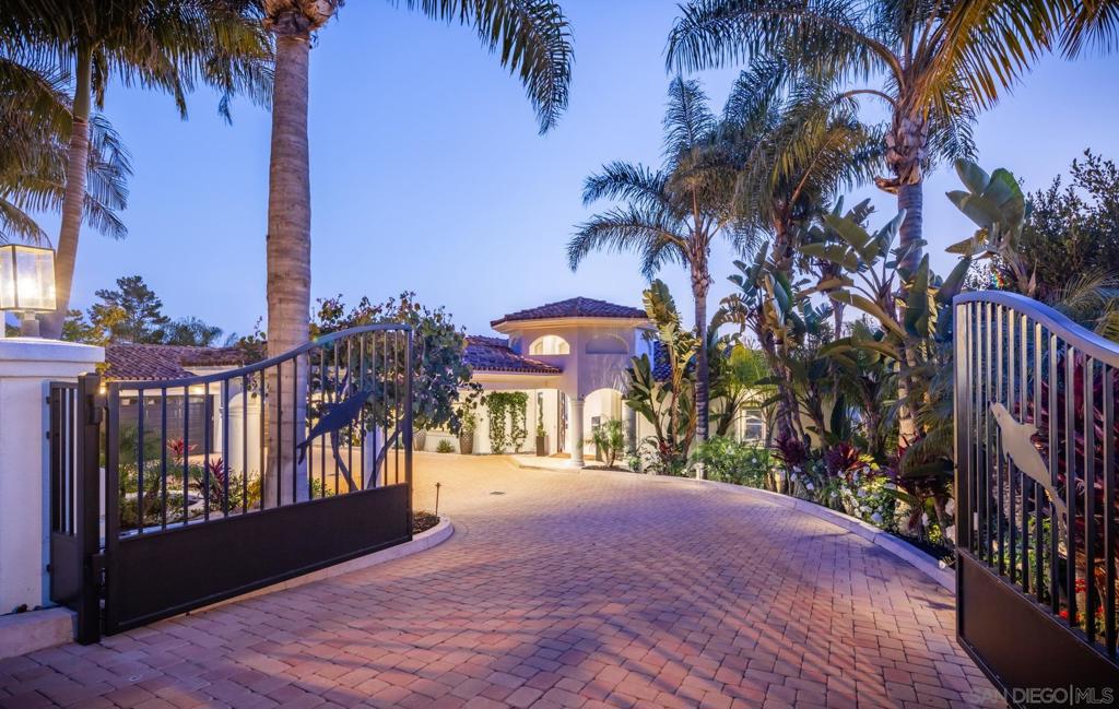 From the moment of arrival, a balance of grandiose architectural elements and thoughtful details set the tone for this unparalleled hillside estate. Situated on a stunning lot in the coveted LaCosta Estates neighborhood. This home includes six bedrooms and 7 1/2 baths spread perfectly across 8300 ft.² of indoor space. Upon entrance, visitors are stunned with direct oceanfront and sunset views. The main floor includes a chef's kitchen and wet bar which leads to an expansive balcony to enjoy breakfast or sunset dinners. The second floor offers four bedroom suites, each with its own private full bathroom and gorgeous private balconies across from a custom 6 seat state of the art theater room. The lower level offers a bedroom with lanai, spa and steam shower adjacent to an extra large , game room. This leads to a resort sized pool, full outdoor kitchen and full pool house bath. This space is ideal for entertaining 100 guests or privately, enjoying the quiet serenity and views that complete this LaCosta Jewel. Less than 15 minutes from McClellan – Palomar airport and World class Luxury golf resorts, Including Aviara, Costa, and the new beachfront, Marea.