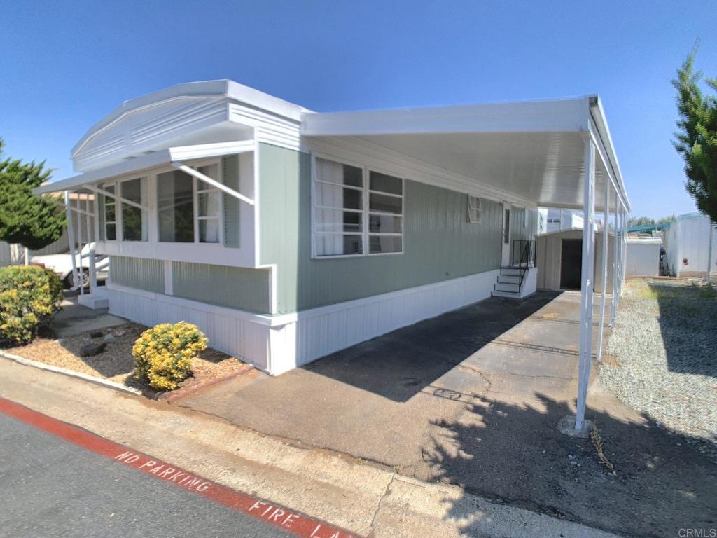 Affordable & Move-In Ready Mobile Home in a Prime Location for seniors! Welcome to your next home—fresh, affordable, and full of charm! This beautifully updated mobile home offers new interior and exterior paint, brand new flooring, and a clean, move-in-ready feel from the moment you step inside. You’ll love the bright and open layout, ideal for cozy living and easy maintenance. Two spacious sheds offer extra storage, perfect for tools, or hobbies. Nestled in a well-maintained park Include pool and clubhouse. There are restaurants, shopping centers, and a health clinic close by.