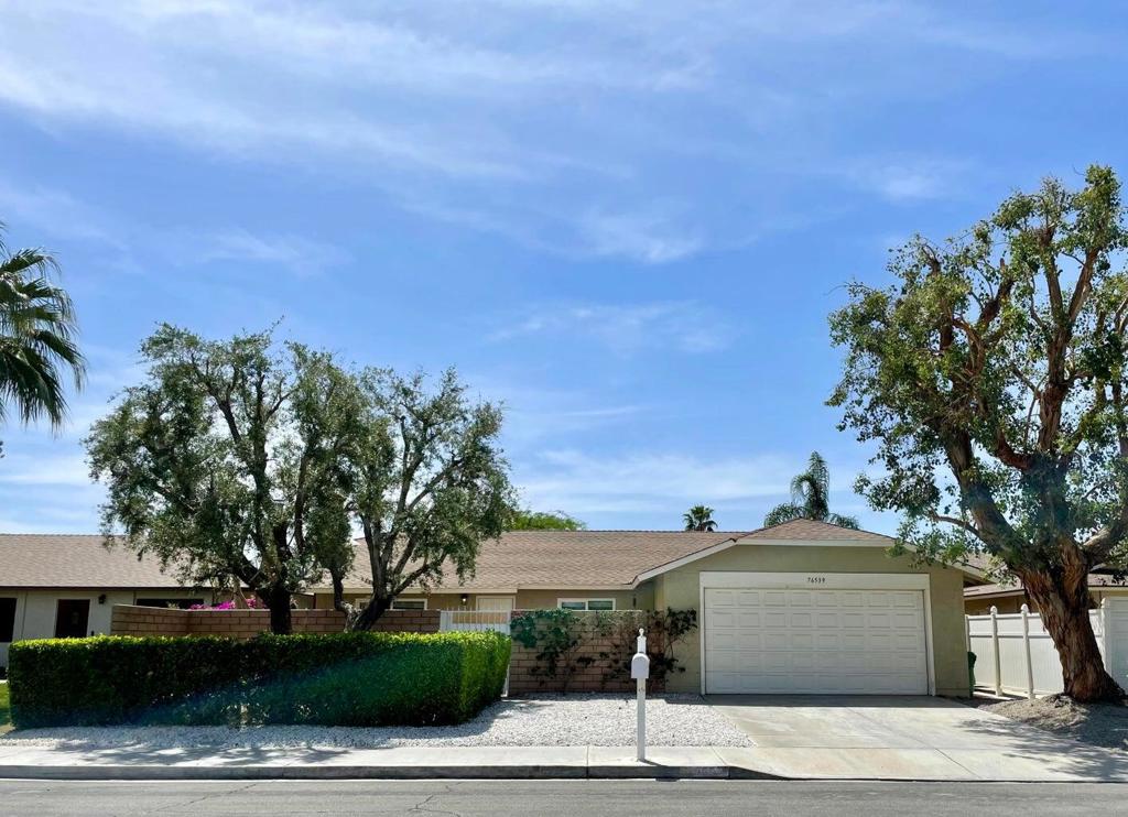 Available for long-term lease! Located on a quiet street in an excellent Palm Desert location, this home features 3 bedrooms, 2 bathrooms, and a 2-car garage..Home offers a beautiful, spacious green backyard with fruit trees-perfect for relaxing or entertaining. Conveniently close to top-rated schools, El Paseo shopping, restaurants, theaters, Palm Desert Civic Center, Palm Desert Aquatic Center, and more. Gardening service is included in the rent. No HOA.
