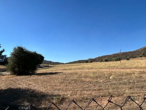 Photo of 0 Oak Glen Road, Cherry Valley, CA 92223 (MLS # CV25224046)