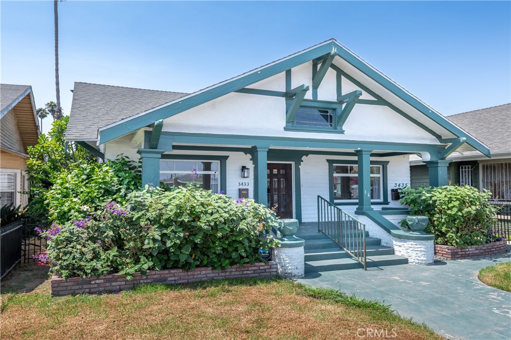 Immerse yourself in timeless sophistication with this beautifully refreshed 2,205 sq ft Craftsman-style home, nestled on a generous 6,390 sq ft lot in the historic heart of Jefferson Park. Built in 1924 and meticulously renovated, this single-family residence offers three inviting bedrooms and two full bathrooms. Inside, sun-drenched living and dining spaces with character-rich architectural details flow seamlessly into a chef-ready kitchen featuring quartz countertops and stainless-steel appliances (range, oven, dishwasher, garbage disposal). The primary suite is a tranquil retreat boasting dual sinks and a luxurious en-suite with a soaking tub and marble accents. Thoughtful upgrades throughout include recessed lighting, upgraded laminate flooring, central heat and A/C, dual-pane windows, and an efficient indoor laundry area conveniently located near the kitchen. Step outside to enjoy a private, fenced-in front yard—ideal for gardening, relaxing, or hosting—plus on-site parking behind a gated driveway, ensuring convenience.
Perfectly located on a tranquil, tree-lined street, this home places you moments from Jefferson Park, the Expo Line, USC, Downtown L.A., Culver City, and vibrant West Adams destinations.