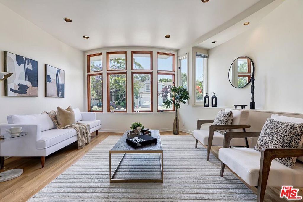 After remodeling, we reintroduce this 4BR, 5BA + a custom heptagonal office with views. This modern/contemporary 4,018 sq/ft Sunset Park home offers a superb living with grand ceilings (26') and abundant natural light. Nestled in a serene cul-de-sac, this residence is a retreat from daily life and convenient to amenities. Step inside to a grand foyer highlighting the home's spacious layout. The main level is designed with family living and entertaining in mind. The family room, serving as the home's central hub, features a wood-burning fireplace adding warmth and comfort. This space seamlessly transitions to the outdoor area, where a lap pool and spa await. Imagine spending afternoons lounging by the pool, surrounded by lush greenery and the sound of water, creating a tranquil backyard oasis. The heart of this home is the spacious open kitchen. This chef-inspired space has three sinks and a large central island, perfect for preparing meals and hosting gatherings.