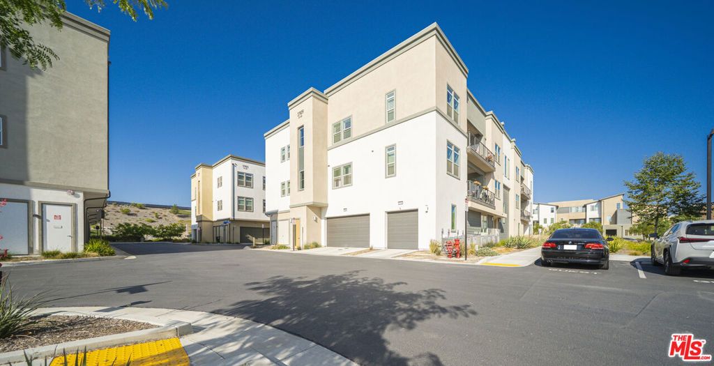 Photo of 27409 Journey Place #205, Valencia, CA 91381 (MLS # 25593901)