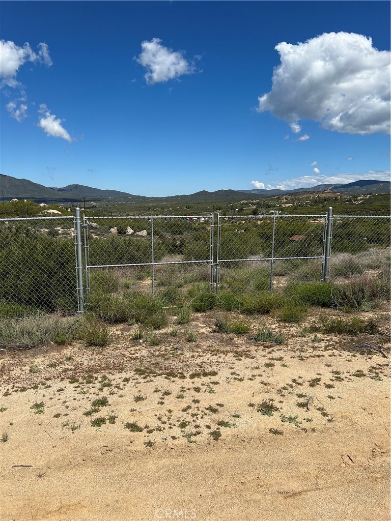 Just reduced $30,000, makes this a sweet deal. Fabulous gentle sloping property approximately 4.56 acres. Level sections perfect for a pad. State of the art pump house with newer equipment. Fully fenced chain link. This property is closer to Anza city for convenient shopping and gas. This property is priced to sell! Main road, Baustia has been paved and scouts road is a short dirt road. Contact listing agent for additional details.