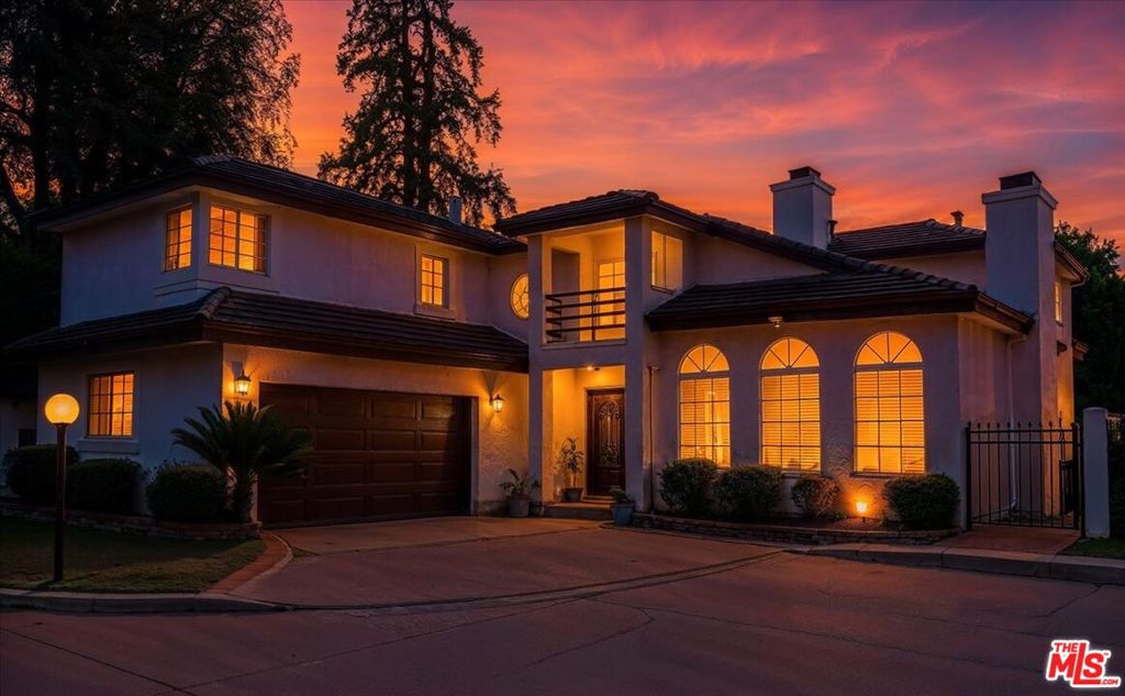 Magnificent, remodeled, furnished 2 story 5 bedroom 5 bathroom home on private gated street for 4 homes, in prime Studio City, south of Ventura Blvd. Meticulously maintained, with four spacious bedrooms upstairs, all en-suite, featuring walk-in closets and hardwood floors throughout. Primary bedroom with fireplace and bathroom with jetted tub and bidet, opens out (second bedroom also opens) to a long second floor patio overlooking the backyard patio and coy pond filled with a variety of fish. Huge living room with fireplace, dining area and family room, also with fireplace, open to the large, private backyard patio. Cooks kitchen has Sub Zero refrigerator, double ovens, plenty of counter space, custom cabinetry, and center island features a second sink with custom fixtures and fittings. There is a bonus step down pantry or wine cellar or storage room with custom shelving. Upstairs is bonus space between bedrooms for an office or workout or play area. Central Vacuum system, dual zone AC and front grassy yard. Oversized 2 car garage, with included washer and dryer, has direct entry into the residence, and the motor court can park an extra 4 cars. all furniture in photos is included with the property. Half a block from Carpenter School and close to shopping and dining, the Sunday Farmer's Market and the popular Sportsman's Landing shopping center featuring the Erewhon market. A most perfect residence for the discerning renter.