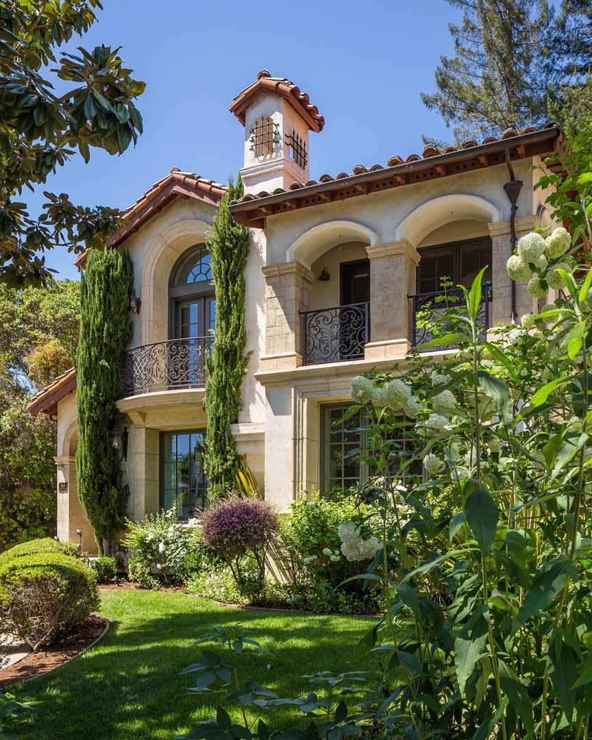 Stunning Mediterranean style w/exceptional attention to detail. High ceilings, 3 fireplaces, tall windows, rooms of generous proportions. Terrific high quality kitchen w/ceiling high cabinets, lg center island---opens to family room and park-like yard. Up = 3 bedrooms w/balconies. MBR w/fireplace. BR/BA on main level. Lower level w/wine cellar, big walk-out family room, gym w/wood floors (5th bedroom); custom fitted office (6th bedroom), lg storage room. Shown by appointment - very easy to see.