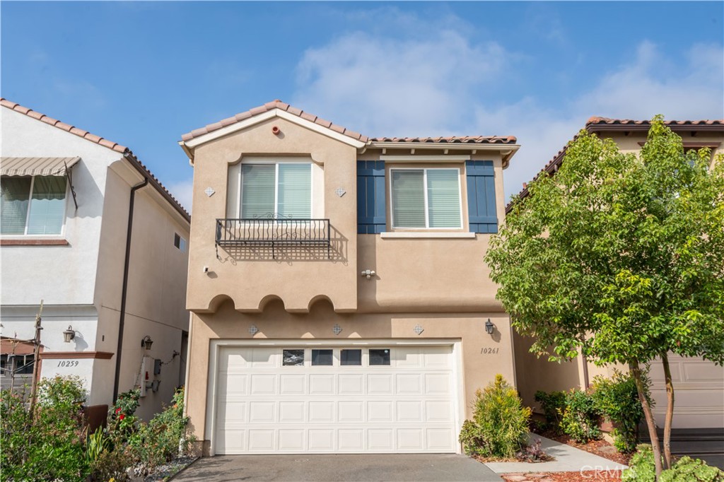This beautiful home is located in one of Pacoima's most sought-after communities, La Ventana Il, and as soon as you step inside you'll immediately recognize the owner's true "Pride-Of-Own- ownership" Here are just a few of its many other outstanding features. You'll step into a flowing 1,574 square foot open concept floor plan that is in "Move-In-Condition" with LED recessed lighting and complementary laminate flooring. The spacious living room is bathed in natural light and has a beautifully mantled fireplace. The family's chef will appreciate the kitchen's abundant cabinets, ample quartz counters with full mosaic tile back-splash, durable dual basin stainless steel sink with custom faucet, built-in stainless steel appliances, and the convenience of the large adjoining dining area with its custom lighting, breakfast bar, and direct patio access 4 bedrooms; The grand suite has a walk-in closet, a beautifully appointed bathroom with dual sink mirrored vanity and private commode. A total of 2½ bathrooms; The ½ is located on the first level for your guests. Functionally located laundry area. Dual pane energy-efficient windows and Tesla solar panels will help keep your utility bills low, Central air & heat for year-round comfort. Your going to appreciate and enjoy the back- yard's privacy fencing, lush landscaping and patio + 2 direct access garage pre-wired for EV charger. Great location close to shopping, restaurants, the 5, 118 & 210 freeways, and minutes away from Hansen Dam Recreation area with its golf course, aquatic center, and comprehensive sport amenities and activities