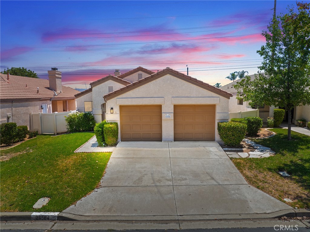 Welcome to this charming home in the beautiful Casa Murrieta 55+ community in Menifee! This home features 2 bedrooms, 2 bathrooms, vinyl flooring throughout the entire home, exterior paint completed in April 2025, all windows professionally washed inside and out and all windows have new screens, with a solar screen on the kitchen window. The AC unit is 7 years old, with a new motor/compressor replacement in 2024. Enjoy a cup of coffee in the front courtyard or a peaceful evening in the nicely landscaped backyard under one of two patio covers. The backyard offers multiple fruit trees, such as, apple, tangerine, peach and blood orange. This adorable home and community has so much to offer! It is well maintained and move in ready, or ready for you to update to your liking. Casa Murrieta HOA offers a beautifully maintained community, gated pool and jacuzzi, and front yard grass maintenance. Don't miss out on this wonderful 55+ home and community!