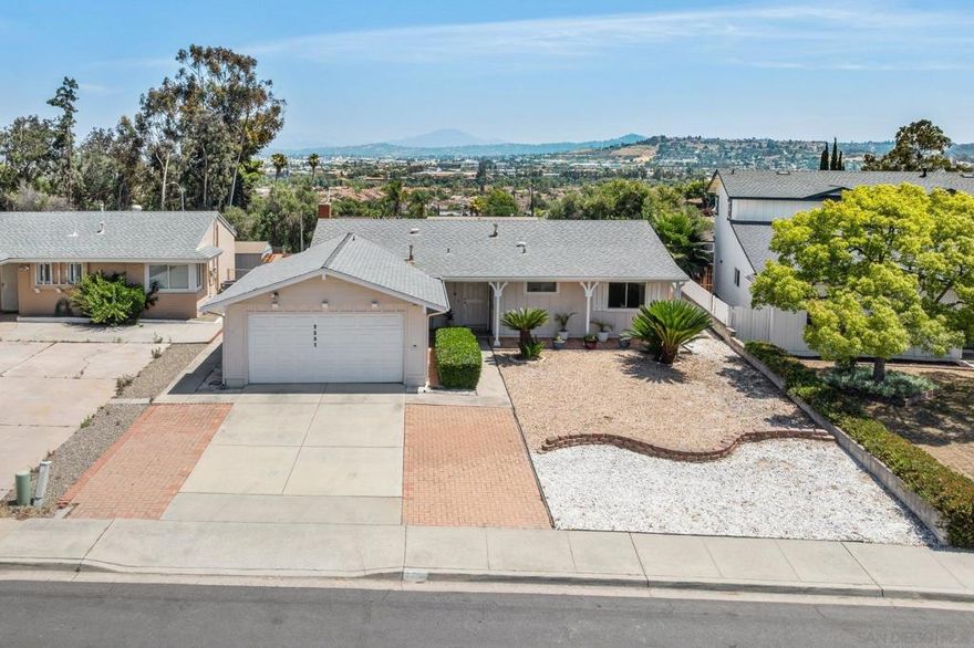 Welcome to this beautifully maintained single-family home, offering breathtaking views of Santee. Thoughtfully updated, this residence features a modern kitchen complete with elegant quartz countertops and a spacious pantry. The remodeled bathrooms, built-in bookcases, and additional living space create a warm and inviting atmosphere—perfect for entertaining.  Step outside to a generous concrete patio, where you can enjoy dazzling holiday fireworks and panoramic views of the city. Ideally located near shopping, dining, Santee Lakes, and more, this home provides both convenience and community. With room to personalize and build equity, it’s a fantastic opportunity for anyone looking to make Santee their home.