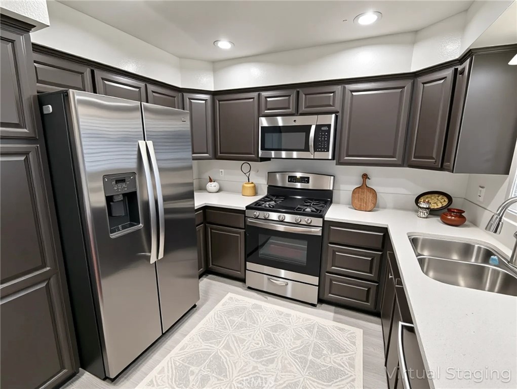 Recently Renovated Corner Unit in the Best Location of Northbrooke!?This beautifully updated townhome is perfectly positioned in one of the most desirable and private locations within the Northbrooke community. As a coveted corner unit, it offers maximum privacy, abundant natural light from oversized windows, and serene views of the lush, manicured landscaping. Inside, you'll find a thoughtfully renovated interior, featuring remodeled bathrooms and an upgraded kitchen with newer appliances, fresh countertops, and ample cabinetry. The spacious living room boasts dramatic two-story ceilings, floor-to-ceiling windows, recessed lighting, and a cozy fireplace that opens to your private patio—ideal for relaxing or entertaining. The second level includes a formal dining area with a wet bar and a bright kitchen that opens to a casual dining space. A newly remodeled powder room with modern finishes completes the main living area. Upstairs, enjoy three well-sized bedrooms, including a spacious primary suite with a walk-in closet and a fresh, updated look that enhances both comfort and style. Northbrooke offers a resort-style lifestyle with three spas, a large pool, two tennis courts, and peaceful brooks winding through beautifully landscaped grounds. Water, trash, and building insurance are included in the HOA for added convenience. Ideally located near Northridge Fashion Center, Costco, and other major shopping and grocery destinations.
This turnkey home blends modern upgrades with timeless appeal—schedule your private tour today!
All photos have been virtually staged.