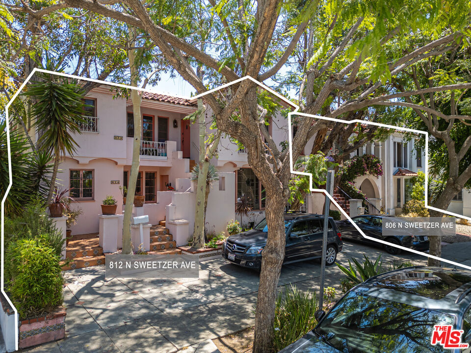 Introducing 806-812 North Sweetzer Avenue, two contiguous multifamily lots offering five total units in the heart of West Hollywood, steps from the iconic Melrose Place. Built in 1933, these charming Spanish-style buildings combine vintage character with outstanding location. 806 Sweetzer features two units across 3,126 sq ft of living space on a 5,998 sq ft lot, while 812 Sweetzer offers three units totaling 4,289 sq ft on a 5,988 sq ft lot. Each property includes six parking spaces, generous layouts, and attractive LaR3 zoning. Together, they provide an immediate opportunity to generate rental income, owner-occupy, or reposition. Offered at $2,790,000 each, this portfolio represents rare flexibility. These properties can be purchased together to create a larger footprint. For investors seeking long-term upside, fully designed plans for a 23-unit apartment building are included with the sale. Currently in the permitting phase, the project provides a clear path toward redevelopment while still allowing immediate rental income potential. Beyond the buildings, residents benefit from West Hollywood's unmatched walkability, premier dining and retail, and robust municipal services, including excellent public safety and community amenities.