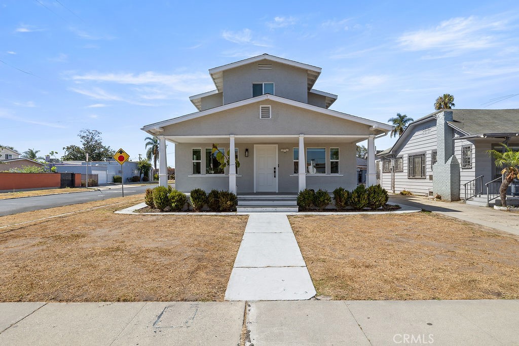 Nestled on the distinguished 101st Street, this meticulously remodeled residence stands as the epitome of contemporary elegance and comfort. As one of the only two-story homes on the block and the largest, it commands attention with its grandeur and sophistication. Prepare to be captivated from the moment you step inside. This home has been fully gutted and remodeled, ensuring that every detail has been carefully considered and executed to perfection. Begin your journey through this stunning home by entering into a sanctuary where every element exudes luxury and style. The ground floor welcomes you with an open living space that seamlessly flows from the entryway to the chef-inspired kitchen, complete with all-new appliances. Wood floors add warmth and charm, creating an inviting atmosphere for both relaxation and entertainment. Convenience is key with two generously sized bedrooms and a convenient full and half bathroom located downstairs, offering easy accessibility and comfort. Additionally, a dedicated laundry room, adding a practical touch to the home's impeccable design. As you ascend the staircase to the second floor, you'll find two additional bedrooms and a full bathroom, providing a tranquil retreat away from the hustle and bustle of daily life. But the allure of 800 W 101st Street extends beyond its interior. Step outside to discover your own private oasis, complete with a lush backyard featuring a grassy area and meticulously landscaped surroundings. Whether you're hosting gatherings or simply enjoying a quiet moment outdoors, this space offers endless possibilities for enjoyment and relaxation. Exploring the separate two-car garage, which not only provides ample parking and storage space but also offers the exciting opportunity to convert into an ADU. With this option, the potential for customization and expansion is boundless, allowing you to truly make this home your own.