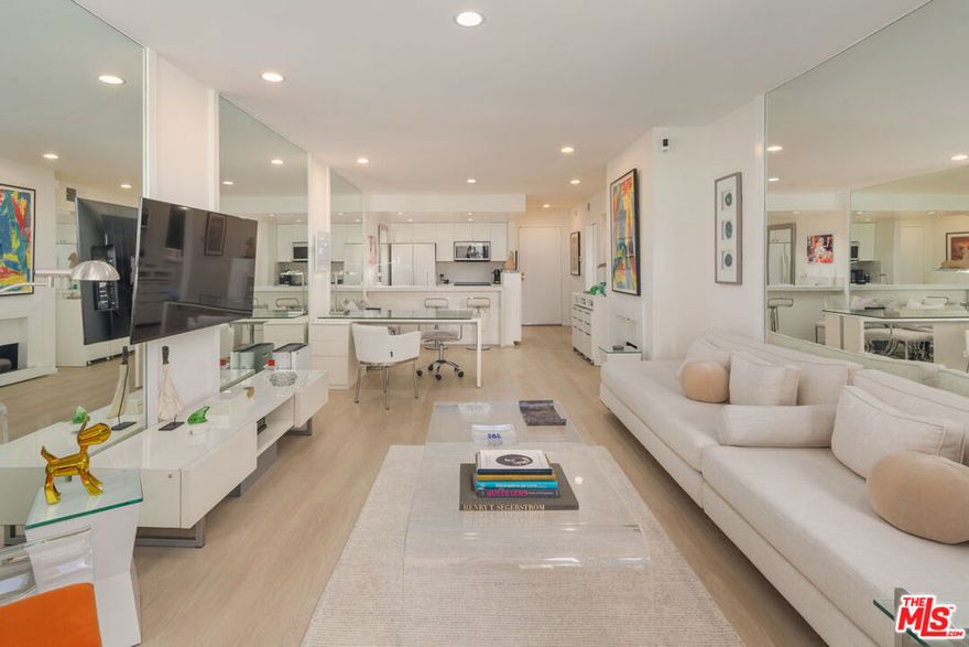 Experience contemporary city living at its finest in this sleek 1-bedroom, 1-bath residence at the sought-after Briarwood complex. This modern unit features an open-concept layout with clean lines, stylish finishes, and is flooded with natural light throughout. The living room flows seamlessly to a spacious private patio, complete with a tranquil stone waterfall floor fountain - the perfect place to unwind or entertain. A kitchen outfitted with stainless steel appliances combines elegance with modern appeal, while a thoughtfully designed layout ensures effortless flow to the bedroom. Ample space and a generous walk-in closet make the bedroom a serene retreat, complemented by an updated bath that adds a touch of luxury. Residents of Briarwood enjoy resort-style amenities, including a large pool, relaxing spa, and recreation room. Nestled just moments from the iconic Runyon Canyon, this home offers the perfect balance of urban convenience and access to nature - ideal for those who love both city energy and outdoor adventure.