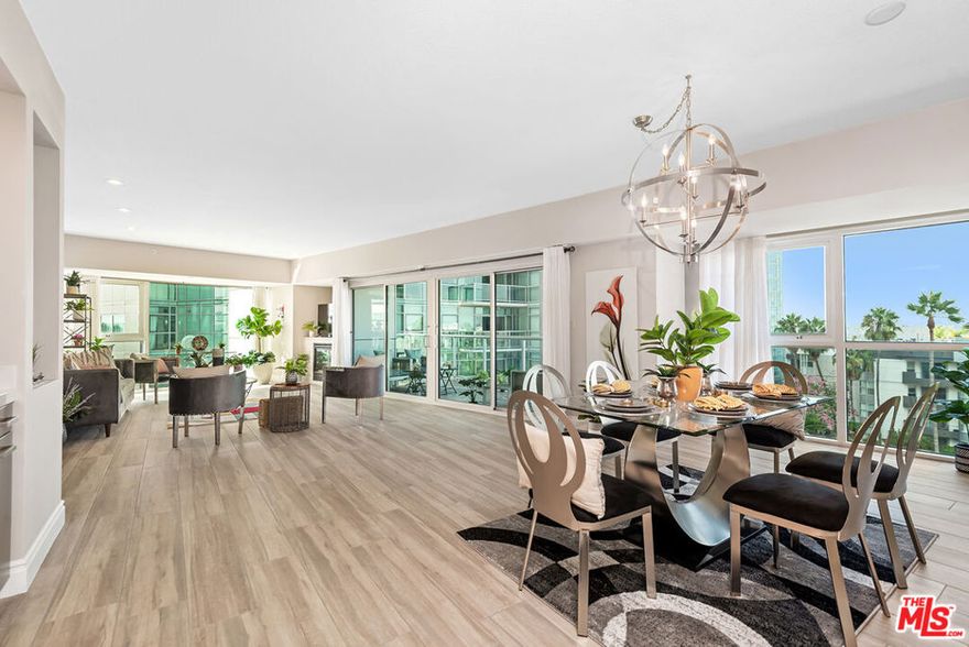 Beautifully renovated corner unit with 2 bedrooms, 2.5 bathrooms and Marina, City, Mountain, and Pool views in the full service, Regatta. Large open floor plan features spacious living and dining areas, full walls of glass, 9 foot ceilings, great natural light, 2 large balconies, gas stove-top and fireplace, gas hook up for a BBQ, and much more. Both bedrooms offer en-suite bathrooms and are located on either end of the unit making it ideal for privacy. Property also offers powder room, 2 car parking, large laundry room with side by side washer and dryer, and much more! Enjoy luxury high rise living with unbeatable amenities and services. Rent includes cable, internet, gas, water, trash, plus an abundance of amenities - 24 hr valet parking for guests, 24 hr front desk and security, concierge, sparkling heated pool and spa with cabanas and fire pits, library, screening room, conference room, indoor fitness center with sauna and locker rooms, and more. Just moments from LAX, Marina access, world famous beaches, trendy shops and restaurants, bike path, dog walk, movie theaters, etc!