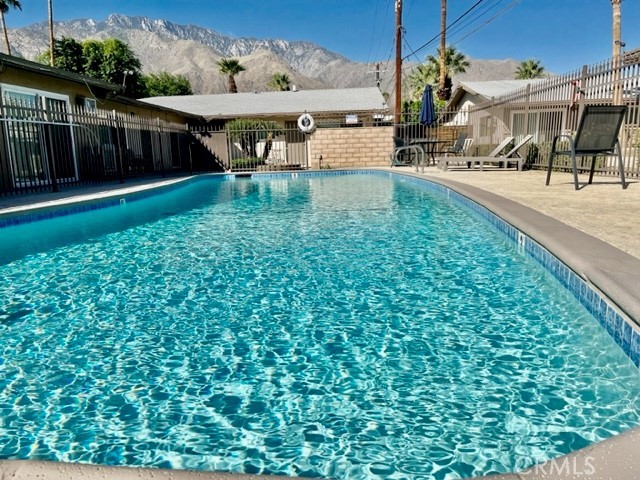 The property is conveniently located across the street from Margaritaville at Vista Chino and Indian Canyon. The property is also located only a few blocks from several schools, and a park and is within close proximity to downtown Palm Springs and all of its amenities.
The property has been renovated both interior and exterior. The renovations include all new exterior painting, exterior foam and stone treatment, all new landscaping, all new lighting, new pool decking, pool furniture, new BBQs in the courtyard, and all new laundry equipment for the laundry rooms.
This unit has updated flooring, new paint, new blinds, new energy-efficient heating, and air conditioning systems, all new appliances, new hardware, and finishes.