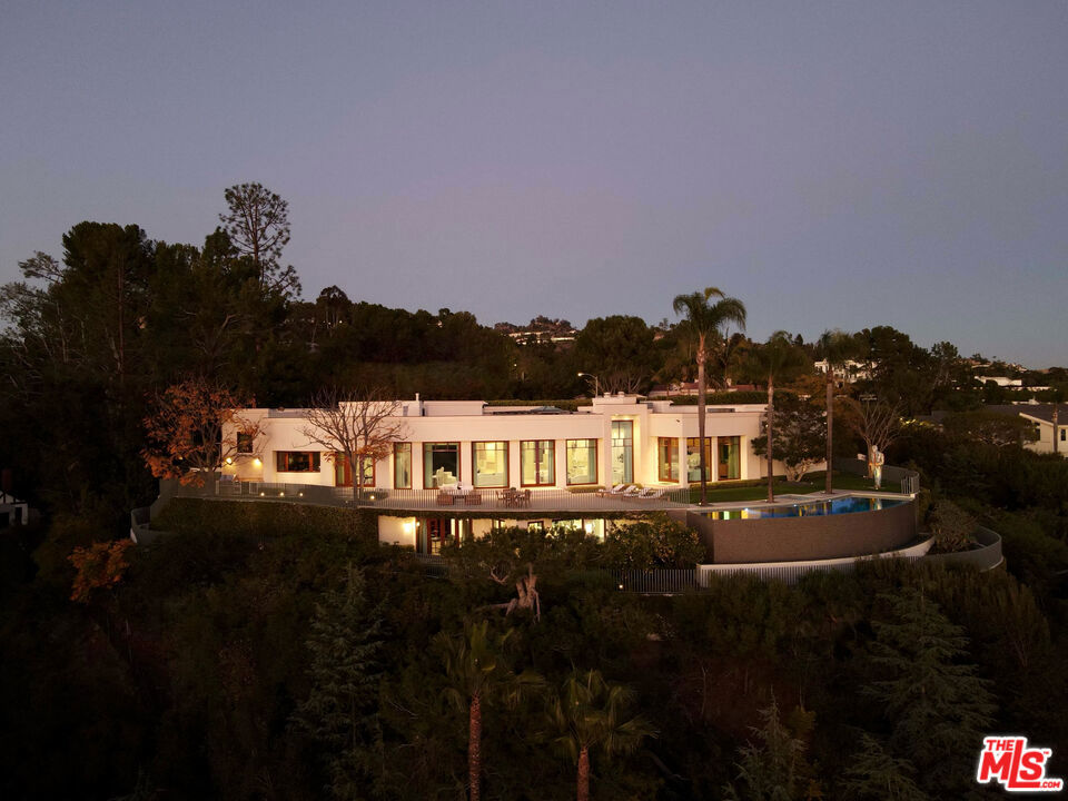 Spectacular contemporary Villa on it's own promontory with the most breathtaking views in Beverly Hills. The home has tremendous scale, phenomenal light quality, total privacy, and a fantastic flat backyard with an infinity pool. There is a decadent primary suite with dual bathrooms and closets, two additional luxurious guest suites, custom wood paneled study, gym, and wine cellar. These are just a few highlights of this special home. A truly unique view estate with world class quality in the most prestigious location in the estate section of Beverly Hills. Neighboring 1116 Calle Vista also available for $7,995,000 creating a 1.5 acre compound with guest/ staff house.