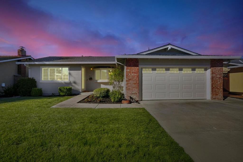 Welcome to 3213 Woodmont Drive, a beautifully updated one-story home. The bright expansive living room welcomes you featuring 3 bedrooms, 2 well-appointed bathrooms, and 1,460 square feet of thoughtfully designed space. The spacious primary ensuite offers a remodeled bathroom with a customized shower with a niche, seamless glass doors, tile surround for a luxurious retreat. Inside, enjoy refinished hardwood floors, enhanced by elegant crown molding and recessed lighting. The heart of the home is the open kitchen, equipped with a breakfast bar, stainless steel appliances and a garden window. Step down to the spacious family room featuring a custom built-in bookcase with cabinets surrounding the gas fireplace offering both functionality and sophistication. The elegant french doors lead you to a patio and private backyard, perfect for relaxation and entertaining. Set on a generous 6,039 square foot lot, this home boasts a fenced backyard with fruit trees, perfect for the garden enthusiasts. The energy-efficient features a smart thermostat, energy efficient appliances and dual pane windows. Walk to Paul Moore Park, Zanotto's Market Starbucks. Close to hwys 85 ,87 and 17, This home offers the perfect blend of comfort and convenience. Don't miss this opportunity!