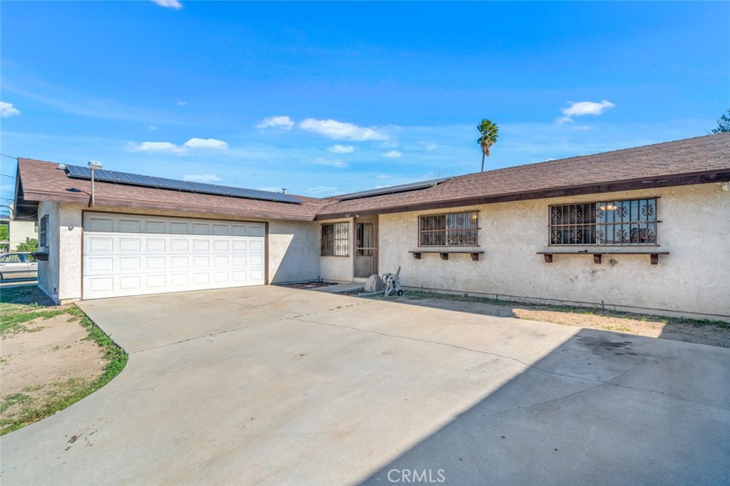 Great home walking distance to Boyd Elementary school and Rialto High School. Sitting on a large lot this home gives you plenty of yard space to create your own oasis in the backyard. Inside you'll find 3 bedrooms that are proportioned well in size. There is a room at the entrance that can be a 4th bedroom or perhaps an office space for those who work from home. The living room features a cozy fireplace and large sliding glass doors to allow natural light inside. Solar panels help keep the cost of electricity low. Come by and take a look!