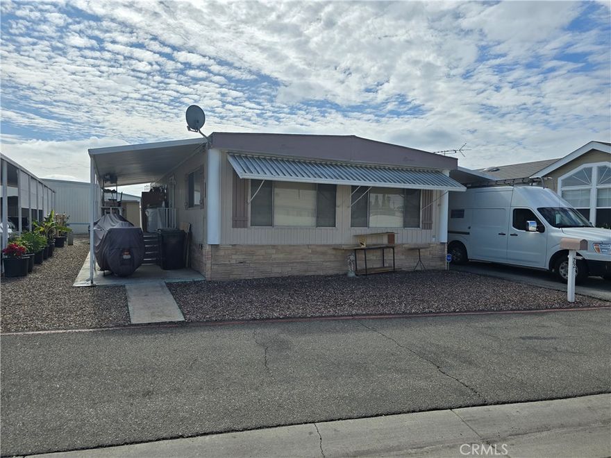 Beautifully upgraded Manufactured Home ,Nestled in the Heart of Rancho La Paz mobil park. That's both -friendly and perfect for All Ages.
The beautiful doublewide unit offers a specious and well-designed interior, perfect for comfortable living area: 2 Bedrooms, 2 Bathrooms.
This home comes fully equipped with essential appliance. The storage shed provide additional space for your convenience.
Indoor laundry room. Outdoor Covered Patio attached 4-5 Carport,  Community Amenities: pool, dog parks, spa, and a clubhouse with a game room.
The location of this property is unbeatable ,close to shopping centers, restaurants ,school, Fullerton Jr College. Close to major freeways  for 
 convenient travel.
 Prime  Location-minutes from Downtown Fullerton, Disneyland ,Knotts Berry Farm, Honda Center, and Angel Stadium, Costco, Hospitals.
This homes offers the perfect blend of comfort, convenience , and  affordability, making it an excellent choice of first -time buyers, families,
or those looking to downsize or need extra income. Don't miss the opportunity to make  this well -appointed property your home.