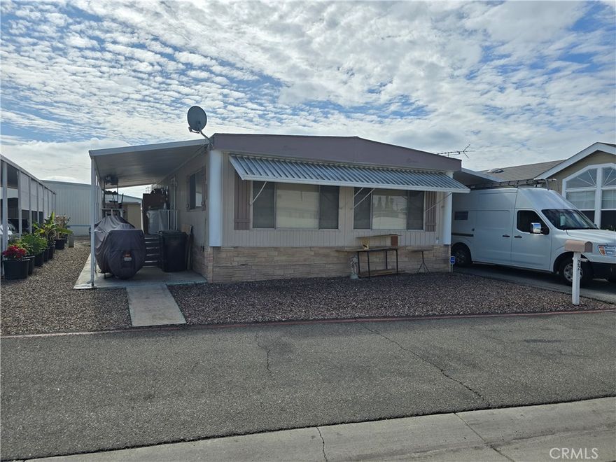 Beautifully upgraded Manufactured Home ,Nestled in the Heart of Rancho La Paz mobil park. That's both -friendly and perfect for All Ages.

The beautiful doublewide unit offers a specious and well-designed interior, perfect for comfortable living area: 2 Bedrooms, 2 Bathrooms.

This home comes fully equipped with essential appliance. The storage shed provide additional space for your convenience.

Indoor laundry room. Outdoor Covered Patio attached 4-5 Carport,  Community Amenities: pool, dog parks, spa, and a clubhouse with a game room.

The location of this property is unbeatable ,close to shopping centers, restaurants ,school, Fullerton Jr College. Close to major freeways  for 

 convenient travel.

 Prime  Location-minutes from Downtown Fullerton, Disneyland ,Knotts Berry Farm, Honda Center, and Angel Stadium, Costco, Hospitals.

This homes offers the perfect blend of comfort, convenience , and  affordability, making it an excellent choice of first -time buyers, families,

or those looking to downsize or need extra income. Don't miss the opportunity to make  this well -appointed property your home.