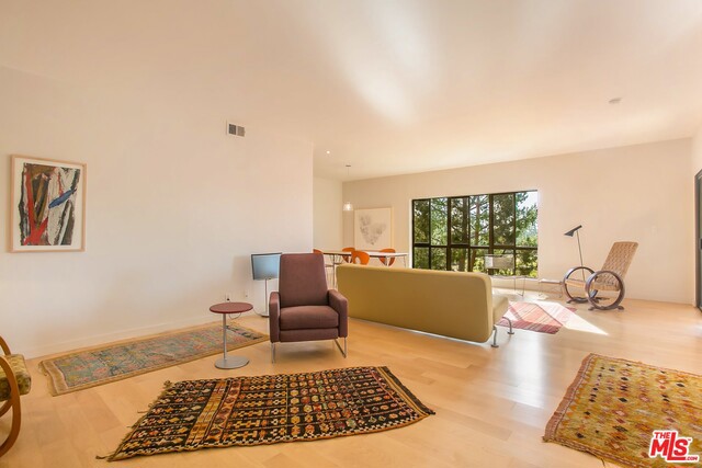 This top floor unit has the best views of the 13th hole & 14th gateway. Architect redesigned open floor plan creates a seamless flow between spaces that maximizes the golf views from every room and floods the entire space with light. Contemporary, finely crafted woodwork throughout accents this mid-century condo. Spacious living room & balcony are delightful for indoor-outdoor entertaining. Canadian maple wood flooring, hip remodeled baths, recessed lighting, built-in workspace and plenty of closets & storage make this condo pleasing to any buyer. Hancock Park Terrace offers a lushly landscaped, guard-gated community with pool & spa - just minutes from LA Tennis Club, Wilshire Country Club, Larchmont Village, Hollywood Studios, Farmer's Market & restaurants. Enjoy the front row seats to Wilshire Country Club's July 4th fireworks!