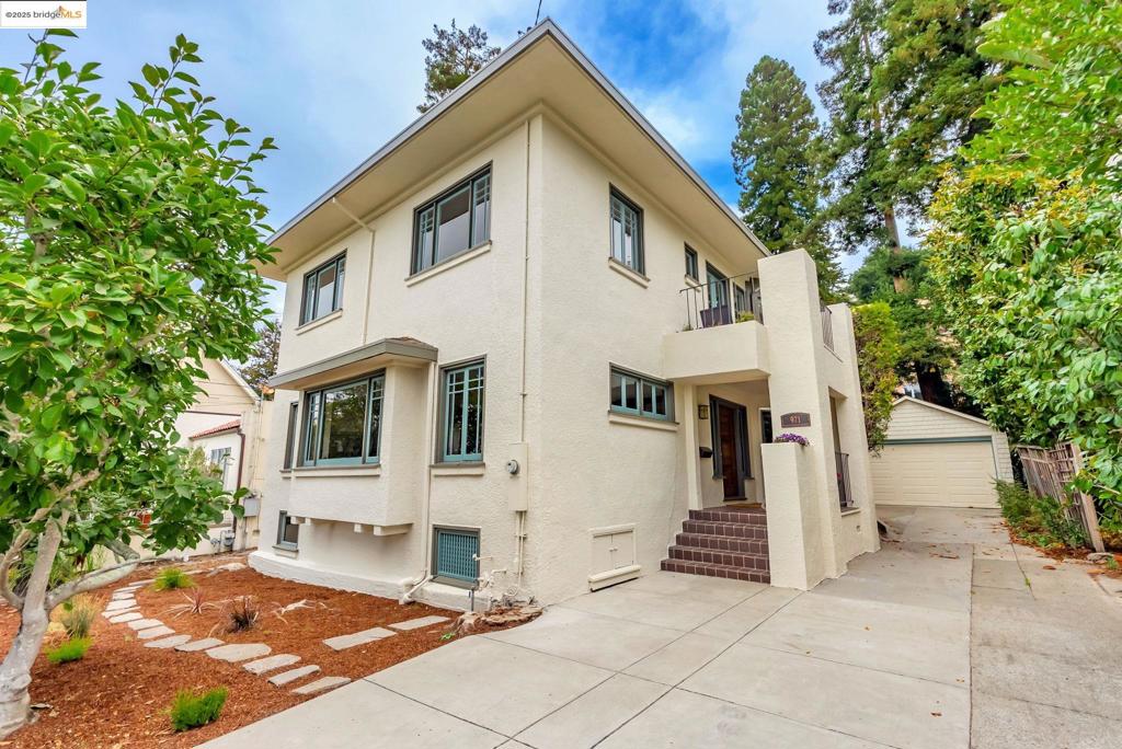 Discover timeless elegance in this Grand Craftsman home nestled in the desirable North Berkeley Hills, offering magnificent San Francisco Bay views. Built in 1925 by renowned builder Charles Clinton Gifford for his family, this century-old residence showcases exquisite architectural details throughout. Spanning 2,454 square feet, this meticulously maintained and recently renovated home features 5+ bedrooms and 3 full bathrooms, including a main-level bedroom and bath, plus a bonus 234-square-foot California sleeping porch. Expansive windows fill spacious rooms with natural light, highlighting rich hardwood and redwood flooring. Elegant redwood paneling and built-ins in the living and dining rooms add warmth and charm. A brick fireplace anchors the living room, creating a cozy focal point for gatherings. The kitchen blends classic style with modern updates, featuring MSI quartz countertops and all new appliances. Upstairs, a side porch invites you to enjoy fresh air and Bay views. With ample parking, a detached garage, and a charming private backyard, this home sits just above Spruce Street, with easy access to transportation. Acquired from the Gifford family by the current owner in 1965, this is the first time this Berkeley historic home is offered for sale. Welcome Home!