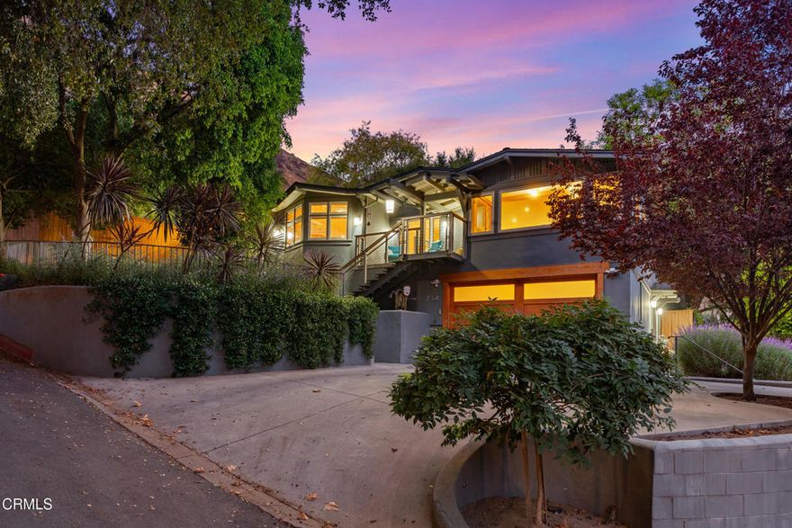 Welcome to 734 Skyland--prepare to be wowed by this rare artistic sanctuary!  This one-of-a-kind retreat is brimming with character and charm. Hand-crafted details accent the walls throughout, creating a truly unique atmosphere.  The living room showcases city lights and treetop views through expansive wall-to-wall windows and features a wood-burning fireplace, along with custom detailing that enhances the artistic vibe. The spacious, updated kitchen boasts new appliances, a large breakfast counter with seating for five, and opens to a recently added family room. This inviting space includes a mesmerizing water-vapor fireplace, views of the pool and spa, direct access to the backyard and a breathtaking mountain view.The primary suite is tucked away on the lower level with private access to the side yard, while two additional bedrooms sit on the main level, one of which opens directly to the backyard pool area.  Step outside to your own private backyard resort with an inviting infinity pool and spa as well as a grassy play area for kids.  A truly rare and distinctive feature is the dedicated space with an Airstream trailer (negotiable). The fully fenced yard includes two mature Mexican lime trees, a newly planted rose garden and lemon tree.  Notable upgrades include: new roof in 2021, new underground drip sprinkler system, new sewer line in 2021, tankless water heater, central air & heat, parking for four cars in the driveway plus a two-car garage.  You're only one offer away....