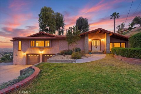 Photo of 12021 Honey Hill Dr, Grand Terrace, CA 92313 (MLS # SW26066432)