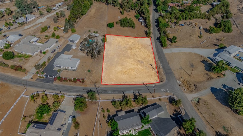 Incredible Opportunity in the Heart of Menifee/Canyon Lake!
This expansive 38,333 sq ft lot—just over an acre of usable, fenced land on a corner lot—is a rare find in one of Menifee’s most convenient and rapidly growing areas. The groundwork is laid for you to design and build the custom home you’ve always envisioned. Whether you’re dreaming of a spacious single-family residence, a private estate with room for a pool, workshop, or guesthouse, or simply want extra space for toys, animals, or gardens—this property offers endless potential.
Located just minutes from schools, major freeways, shopping centers, restaurants, and beautiful local parks, you’ll enjoy the perfect balance of peace, privacy, and accessibility. Opportunities like this don’t come around often—secure your slice of Menifee today and start planning your future!