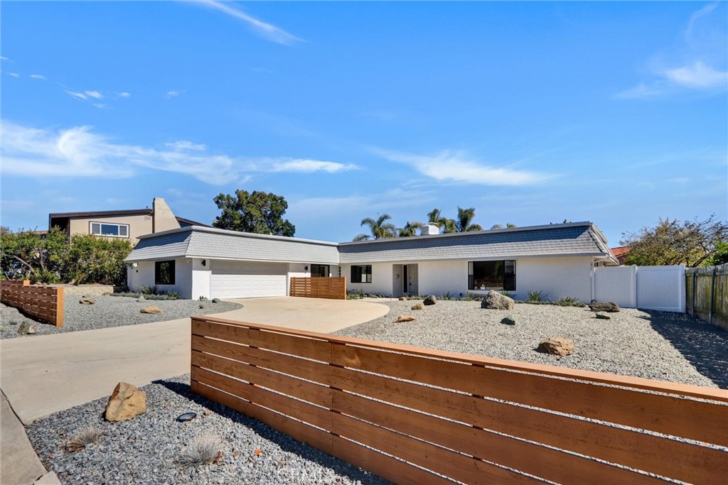 Modern coastal elegance in a prime La Jolla location! Tucked on a quiet street, this stunning single-story home sits on a spacious ~9,900 sq ft lot with 5 beds, 3 baths (incl. bonus suite) and approx. 2,847 sq ft of beautifully remodeled living space. New kitchen features Shaker-style soft-close cabinets, quartz countertops, countertop-to-ceiling backsplash, under cabinet lights, and stainless steel appliances. New baths, floors, paint, doors, and lighting throughout. The inviting primary suite offers a dual-sink vanity, freestanding tub, and frameless shower.
Enjoy skylights, a cozy gas fireplace, peek-a-boo mountain views. Front yard features drought-tolerant landscaping with Wi-Fi–controlled drip irrigation and lighting, while the backyard offers artificial turf for a low-maintenance outdoor living. Finished garage with epoxy floors and long driveway. Brand-new energy-efficient heat pump HVAC system and ducts. New Dual Paned Windows. No HOA. Minutes to beaches, UCSD, and top-rated La Jolla schools.
Link to video & 3D Matterport & more info: (https://blueskypixs.hd.pics/5515-Thunderbird-Ln/idx)