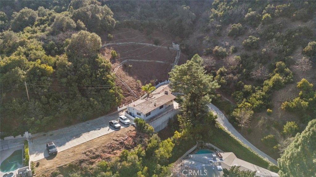 Photo of 3277 Longridge Terrace, Sherman Oaks, CA 91423 (MLS # SR25255534)