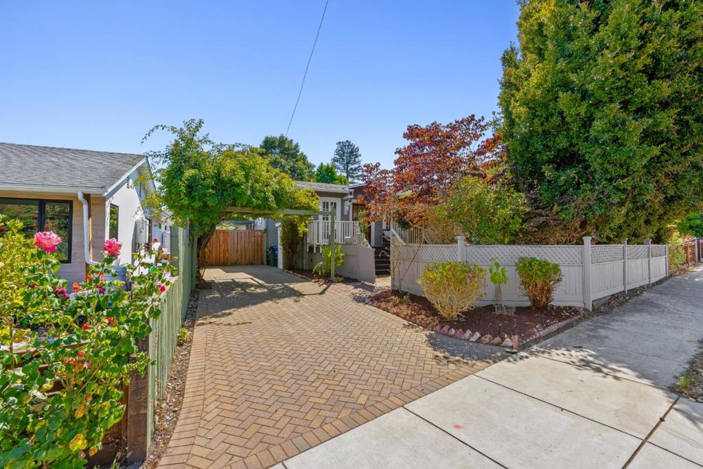 In the heart of Santa Cruzs Westside, this 2-bedroom, 1.5 bath Craftsman bungalow blends classic character and charm with modern comforts. With 1,058 sqft of living space on a spacious 5,706 sq ft lot, it offers room to relax and soak up the coastal lifestyle with surfing just a mile away. There is plenty of sunny space to plant, play, or simply relax with a cup of coffee as the sea breeze rolls in. This home has the potential to be a gardener's dream with front and backyard on timer irrigation. Fruit trees in the backyard features apple, lemon, peach passion fruit, avocado, blackberries and raspberries. Inside, hardwood floors and soft natural light give every room a warm and inviting feel. The layout flows easily, making the most of every square foot, while thoughtful details add a sense of history and soul. The home is powered by a solar system with backup batteries, helping to reduce energy costs. The primary suite features French doors that open directly onto the deck and garden. In the backyard, a 200 sqft detached garage has been transformed into a serene office space and yoga studio/ workshop and could be the perfect foundation for a future ADU. Located just minutes from the university, scenic beaches, and favorite Westside spots for coffee, dining, and shopping.