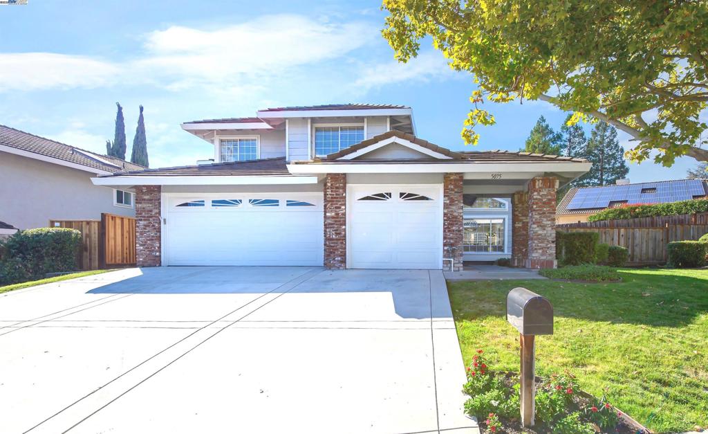 STUNNING VIEWS AWAIT! Nestled in the highly sought-after Canyon Crest community, this EAST facing home is a must see! From the moment you step inside you’re greeted with soaring two-story vaulted ceilings, abundant natural light, wide plank flooring, new lighting, and an elegant formal living and dining room accentuated by a floor to ceiling tile fireplace. The fully remodeled kitchen is a showstopper featuring custom white cabinetry, quartz countertops, marble backsplash, stainless steel appliances, pendant lighting and a large peninsula with seating. Luxuriously updated  bathrooms showcase all custom floor-to-ceiling tile showers and updated vanities with stone counters. This functional floor-plan features ONE BEDROOM & BATH DOWNSTAIRS and a spacious primary suite with vaulted ceiling, two closets and slider to a private balcony with expansive views to the San Ramon valley. Enjoy the spacious backyard with no rear neighbors, new fences, and a large side yard with potential RV/boat access.
