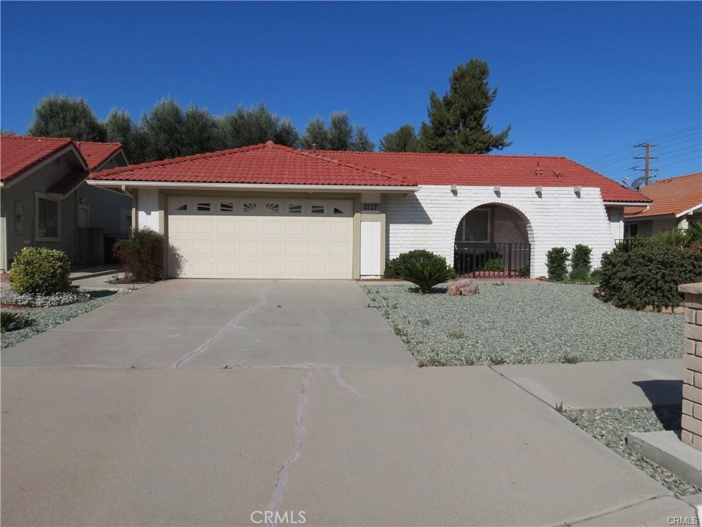 55+ Community located in the desirable Seven Hills Community! This home is a gorgeous and upgraded 2 bedroom two bath. Home boasts a spacious kitchen which includes refrigerator, dining area. Living room with upgraded carpet and fireplace. Open the french doors to the low maintenance backyard that has plenty of room for entertaining, relaxing and enjoying the beautiful mature trees. Includes washer/dryer and fridge. Master bedroom has a huge additional retreat area, that would be perfect for a sitting room, tv room or office/study. Master bathroom is upgrades with a gorgeous tile walk in shower, heater, upgraded lighting. The second bedroom is spacious. The hall bathroom is spacious with plenty of room for guests. You will love this well laid out home, located in a quiet cul-de-sac, golf course community with tons of additional activities and offerings in the community (for additional fees). Close to shopping, entertainment, restaurants and more!