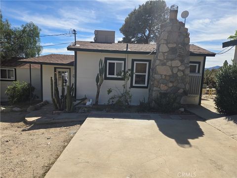 Photo of 8996 Navajo Trail, Morongo Valley, CA 92256 (MLS # JT26055873)