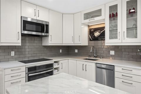 Photo of 2220 Via Mariposa East #C, Laguna Woods, CA 92637 (MLS # OC26046042)