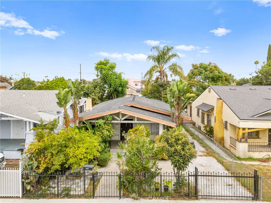Welcome to 1445 W 55th St! Don’t miss this opportunity to save BIG on your monthly payment! Take advantage of a 1% interest rate reduction on ANY loan program – at ZERO cost to you! Lower monthly payments, no extra fees. This inviting 3-bedroom, 2-bathroom home has been lovingly cared for by the same owner for over 30 years. With a comfortable layout and solid structure, it’s the perfect opportunity for anyone looking to add their personal touch. Inside, you’ll find a floor plan that can be fit to your liking. The living room offers a cozy space for relaxing or gathering with loved ones. The kitchen is functional and full of potential, ready for your design ideas. Bedrooms are well-sized with good closet space, and the bathroom is conveniently located in the home. The neighborhood is quiet and clean. Location is prime with the home just 10 minutes from downtown LA with easy access to FWY 110. Whether you're a first-time buyer or looking for a light renovation project, this home offers comfort, charm, and endless possibilities. Contact us for a showing today!