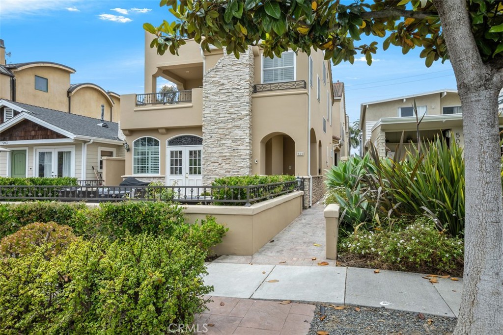 This inviting rear home in a prime location of Corona del Mar Village presents a unique investment opportunity. First time on the market in 28 years. The tri-level condo offers direct access garage entry on the first floor plus a carport. The kitchen and living room are on the second floor, with an additional enclosed deck suitable as a private office or den. Also located on the second floor is a generous primary suite along with a convenient powder room off the kitchen for guests. This condo boasts high ceilings and natural lighting creating an open, yet private ambiance. The third floor hosts the second bedroom with an alcove closet and adjacent full bathroom. Escape to the peaceful, spacious rooftop deck with peek-a-boo views toward the ocean and sweeping vistas of Spyglass Hill to the north. The property was built and maintained by its original owner. A professionally designed floor plan lends itself the opportunity to infuse your personal touch and elevate the interior with sleek luxury upgrades. This exceptional residence offers privacy plus walkable access to world-class beaches, upscale shops, and gourmet dining. Priced to sell!