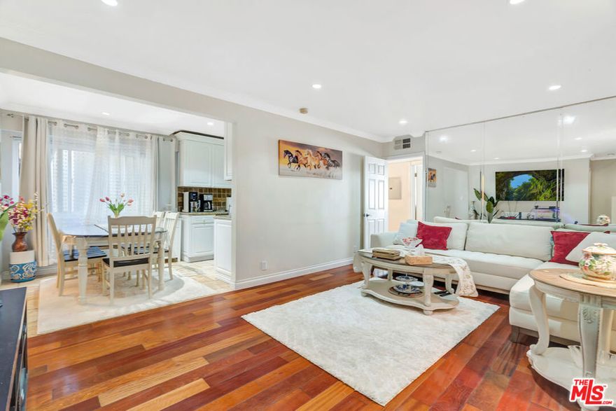 This gorgeous condo, located South of the Boulevard in one of Encino's most sought-after neighborhoods, is a beautifully maintained 2-bedroom, 2-bathroom condo that offers 920 sq ft of well-designed living space in a prime, walkable location. The light-filled unit features an open floor plan, spacious living and dining areas, and the convenience of in-unit laundry. The well-appointed kitchen offers ample cabinetry and counter space, ideal for both everyday living and entertaining. Both bedrooms are generously sized, including a primary suite with an en-suite bath. Enjoy resort-style amenities within the gated community, including a sparkling pool, BBQ area, and a clubhouse for gatherings. Just moments from Ventura Blvd's premier restaurants, shopping, and entertainment, with easy access to freeways and transit. It is conveniently close to Hesby Oaks School, which is highly rated with a score of 9 to 10. A rare opportunity to own in an unbeatable Encino location!