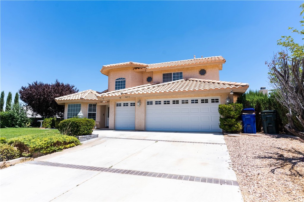 Welcome to 26511 Mainsail Ln, Helendale, CA — a 3 bedroom, 2.5 bathroom entertainer’s dream located in the resort-style Silver Lakes community! This spacious 2,285 sq ft home offers an open floor plan with soaring ceilings and a loft that overlooks the main living area, creating a grand and inviting atmosphere.
The heart of the home features a stylish kitchen with granite countertops and ample cabinet space, flowing seamlessly into the living room — complete with a built-in wet bar, perfect for entertaining. The primary suite is conveniently located downstairs, while the upstairs offers a Jack-and-Jill bedroom layout providing both privacy and function.
Enjoy a generous backyard space with endless possibilities, and take advantage of a 3-car garage for all your storage and parking needs.
As part of the Silver Lakes HOA, residents have access to incredible amenities including a 27-hole championship golf course, two private lakes, a clubhouse, swimming pool, parks, tennis courts, RV and boat parking, and equestrian facilities. This is more than just a home — it’s a lifestyle.
Don’t miss your opportunity to live in one of the High Desert’s most vibrant and amenity-rich communities!