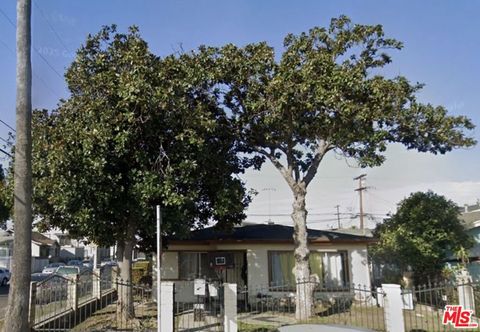 Photo of 5879 Bonsallo Avenue, Los Angeles, CA 90044 (MLS # 25594261)