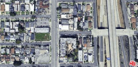 Photo of 4921 S Figueroa Street, Los Angeles, CA 90037 (MLS # 25589295)