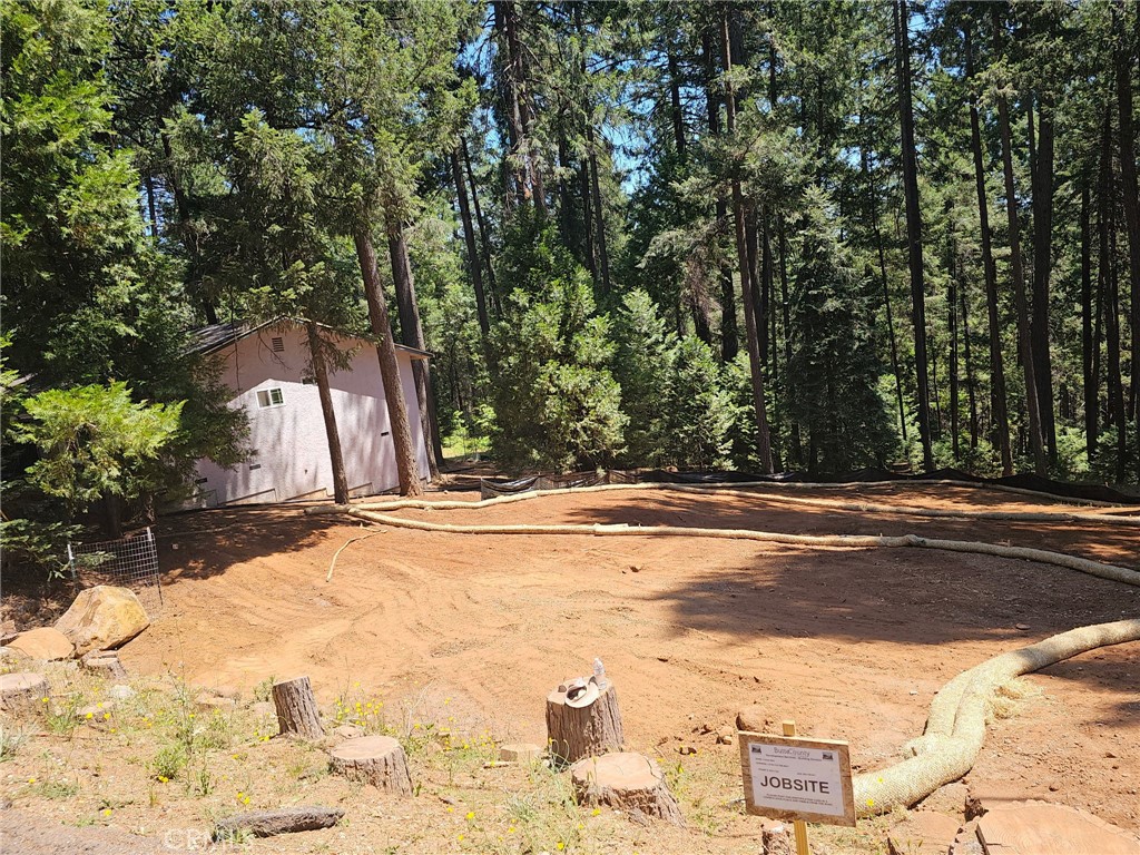 Welcome to 14726 Colter Way, an incredible opportunity to own a .48-acre building lot in the serene community of Magalia. This vacant parcel is a blank canvas, ready for your dream home! Previously, this lot was home to a charming 2-bedroom, 2-bath residence complete with an attached 2-car garage, offering potential for easy re-imagination.
The property features a new 1500-gallon septic tank, installed in September of 2004, providing a head start on your construction plans. With ample space and a desirable location, you'll have the freedom to design the home you've always envisioned. Enjoy the tranquility of the surrounding nature and the convenience of nearby amenities.
Whether you’re looking to build a cozy retreat or forever home, #14726 presents endless possibilities. Don’t miss out on this valuable lot — your future starts here!
