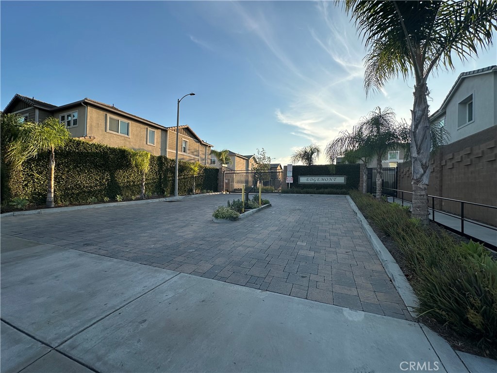 Nestled in the heart of Compton, this stunning 3-bedroom, 3-bathroom condo offers over 1,800 square feet of spacious, modern living, designed to feel like a private oasis. Tucked within a secure, gated community, this move-in-ready home ensures unparalleled privacy and tranquility, perfect for those seeking a serene retreat.
The open-concept layout seamlessly connects the living, dining, and kitchen areas, creating an airy and inviting atmosphere ideal for both relaxation and entertaining. Each bedroom is generously sized, with the primary suite featuring an en-suite bathroom for added luxury. The additional two bathrooms are elegantly appointed, offering convenience and comfort for family or guests.
Step outside to your own private backyard, a peaceful haven for morning coffee or evening gatherings. The charming front porch adds a welcoming touch, perfect for enjoying quiet moments. The attached 2-car garage provides ample storage and convenience.
It is ready for you to make it your own. Experience spacious living with the perfect blend of modern design and secluded comfort in this Compton gem.